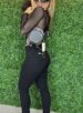 calça jeans preto com rasgo