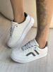 tênis branco com preto snk ramarim 2491103