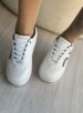 tênis branco com preto snk ramarim 2491103