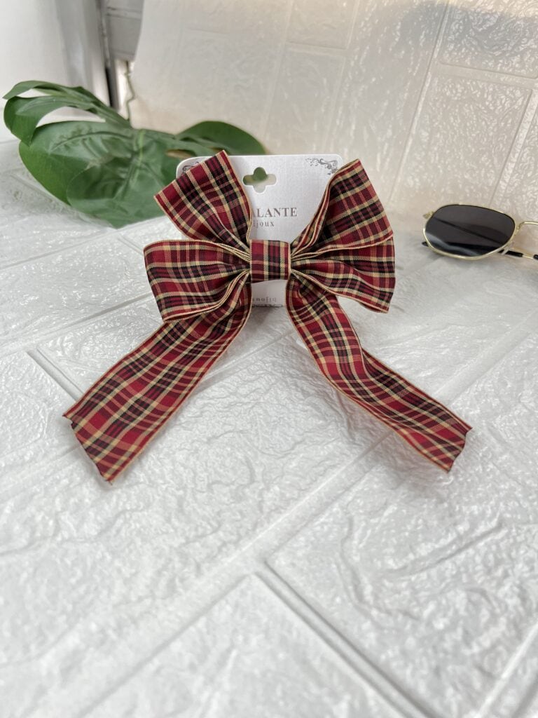 laço de cabelo xadrez vermelho