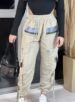 calça parachute zíper bege