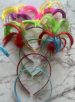 tiara xuxinha pluma