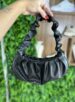 bolsa rihanna preto