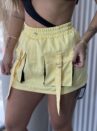 saia com short tai amarelo